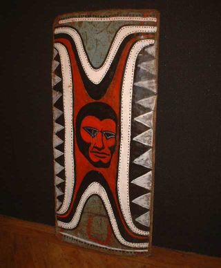 Illustration for article titled Why Does This Comic Book Hero Appear On So Many New Guinea War Shields?